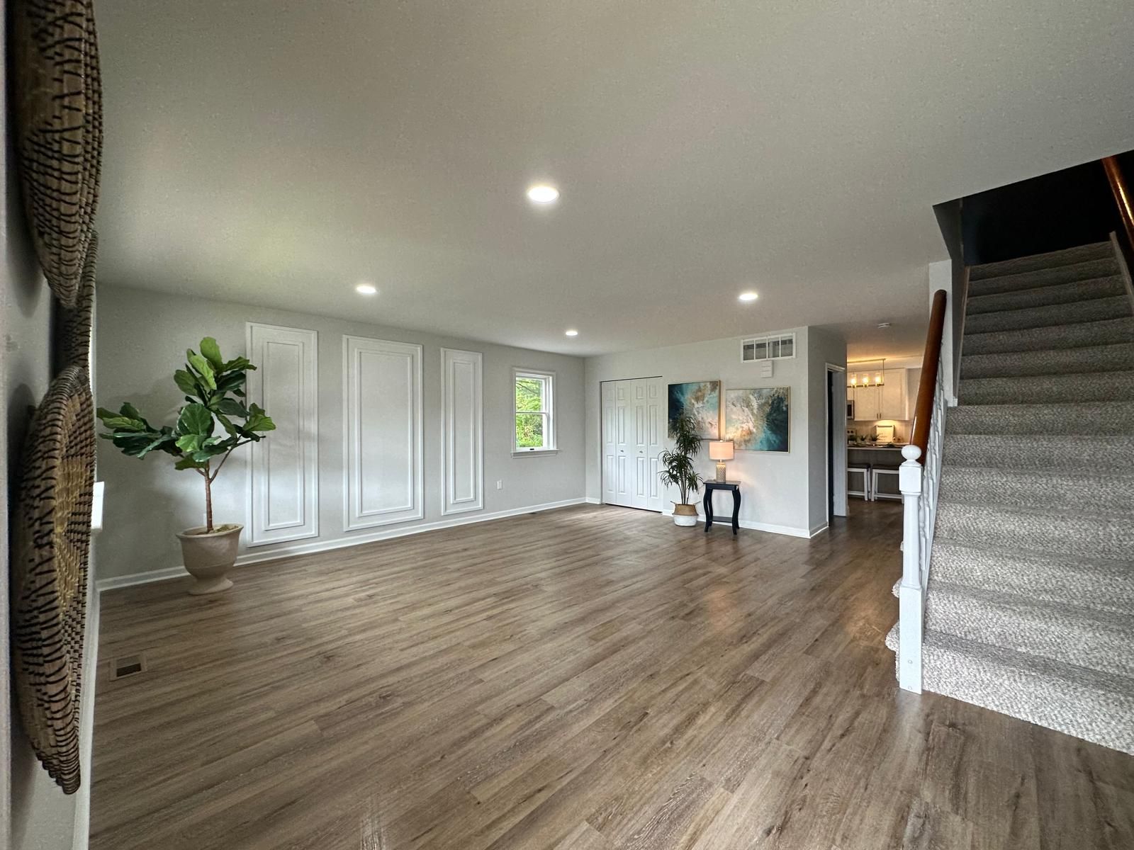 A staircase and hall with new flooring